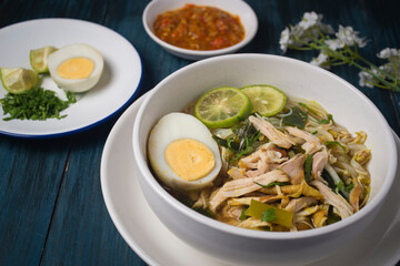 Chicken Soto or Soto Ayam in Indonesia. Soto ayam is a traditional Indonesian dish which uses ingredients such as chicken, vermicelli, bean sprout with turmeric as main ingredient add in the broth.