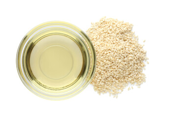 Fresh sesame oil and seeds on white background, top view