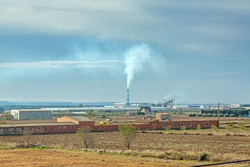 Fototapeta na wymiar Image of a smoking chimney of a waste incineration plant