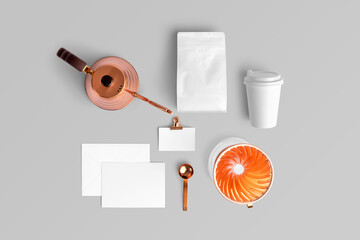 Blank coffee packaging, with the card, paper coffee cup, business card, copper pot, dripper, spoon, coffee packaging mockup with empty space to display your branding design.