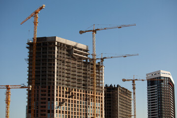 Concrete building construction, industrial progress.