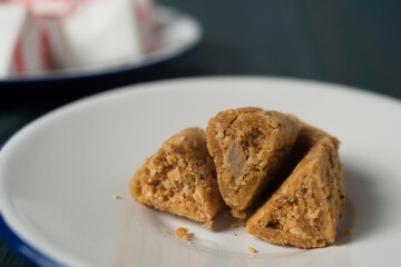 Enting-enting gepuk, traditional sweets from Salatiga, East Java, Indonesia. A sugary peanut mold into triangle shape