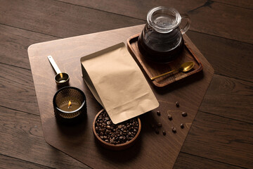 Blank coffee packaging on a wooden table, with pot, coffee seeds bowl, on a wooden background, coffee packaging mockup with empty space to display your branding design.