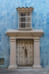 Facade of a blue colonial house in the old town of Cartagena de Indias in Colombia, South America