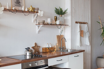 Kitchen sink. Scandinavian interior. White color. Stay at home. Christmas mood and decoration. 
