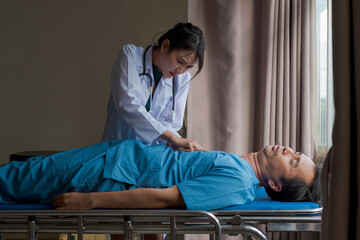 Doctor doing cardio pulmonary resuscitation on an unconscious patient