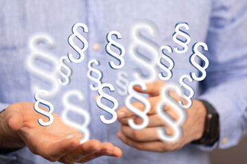 Hand mit Paragraf