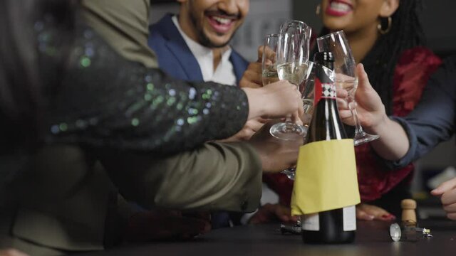 Low Angle Shot of Friends Toasting Their Drinks During New Years Celebrations