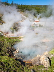 Fototapeta na wymiar Artist's Paint Pots and Blood Geyser in summer, Yellowstone National Park Wyoming.