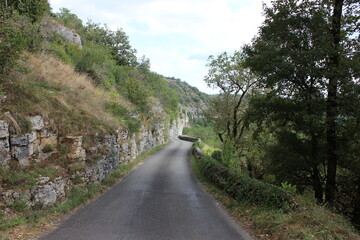 Landscape of road and cliff in the valley of the Dordogne, france
