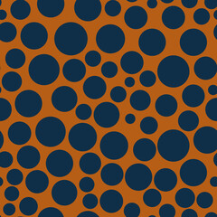 Vector orange and navy geometric organic polka dots seamless pattern. Bright, bold and fun. Perfect for fabric, wallpaper and stationery. Surface pattern design.