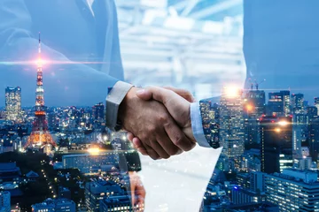 Foto op Plexiglas Welcome. multi exposure of investor businessman handshake with partner for successful meeting with night city background, digital technology, investment, negotiation, partnership, teamwork concept © Vittaya_25