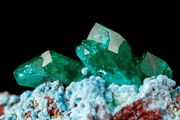 macro mineral stone Dioptase on a black background