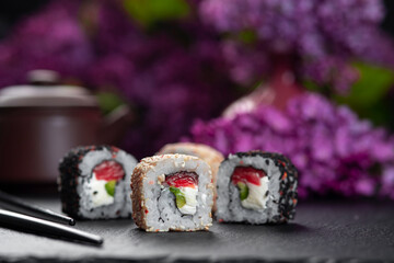 Chess Roll sushi . Traditional delicious fresh sushi roll set with reflection . Sushi menu. Japanese kitchen, restaurant.