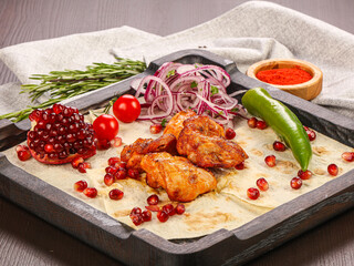 Chicken hip barbecue served onion