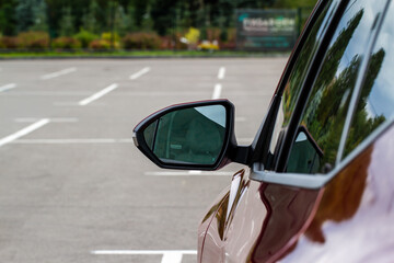 Rear view mirror of a modern car.
