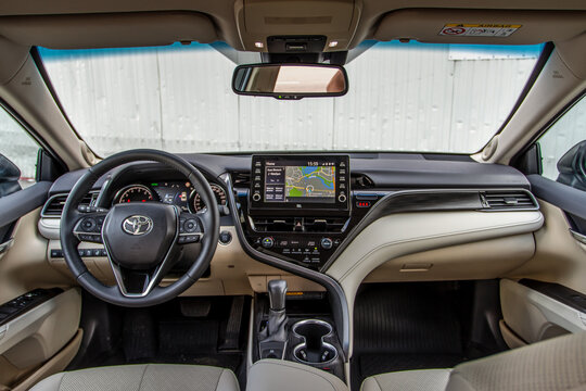 MOSCOW, RUSSIA - AUGUST 15, 2021 Toyota Camry (XV70), a mid-size sedan car model year 2021 on city background. Interior close up view. Interior details of Toyota Camry.
