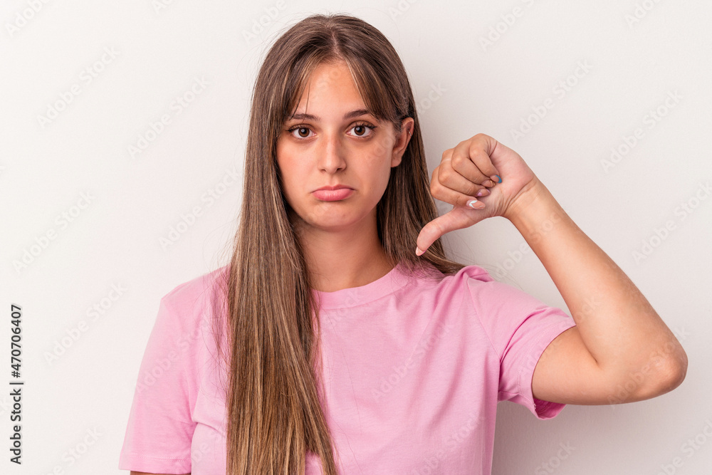 Canvas Prints Young caucasian woman isolated on white background showing a dislike gesture, thumbs down. Disagreement concept.