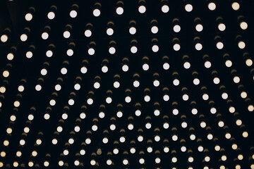 Planty of small bulbs of lights at the ceiling