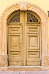 Old door with an interesting ornament, close-up.