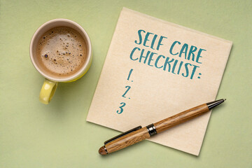 self care checklist - handwriting on a napkin with a cup of coffee, healthy lifestyle, habits and personal development concepts