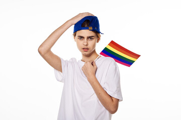 girl in white t-shirt Flag lgbt shemales posing light background