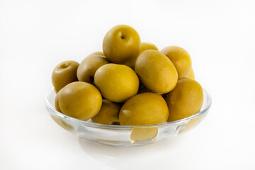Green big olives isolated on white background