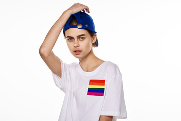 woman wearing white t-shirt lgbt flag inventor community