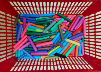 colored caps from markers in a mesh container