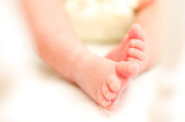 Newborn small foot, white and black.