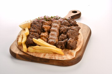 Kebab, traditional Turkish, Greek meat and chickens food, isolated on white background