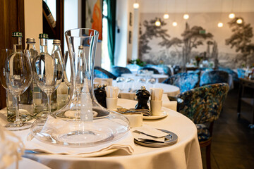 Table arrangement in an expensive haute cuisine restaurant