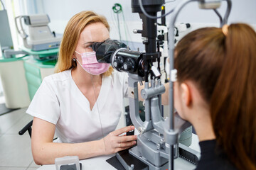 Eye treatment in clinic or hospital with doctor covid time