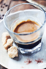 Coffee in glass cup. Close up.	