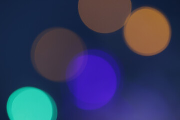 Bright colourful lights in blur and in defocus.