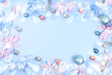 Christmas composition and concept of new year 2022, beautiful holiday decorations on a light background with bright bokeh and snow, postcard, winter banner for the screen with place for text,