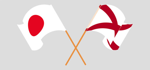 Crossed and waving flags of Japan and The State of Alabama