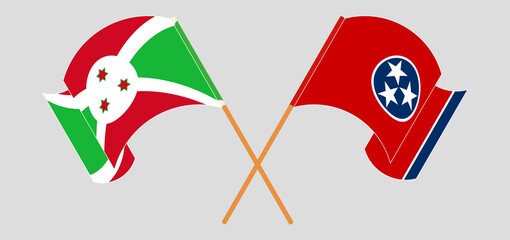 Crossed and waving flags of Burundi and The State of Tennessee
