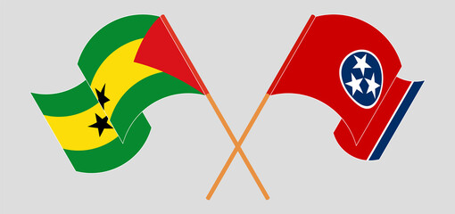 Crossed and waving flags of Sao Tome and Principe and The State of Tennessee
