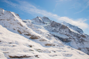 Fototapeta na wymiar Beautiful panoramic view of snow-capped mountains in the Swiss Alps.