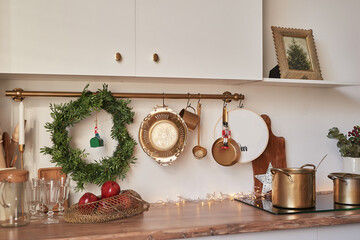 Christmas kitchen and table. Red, green and white decor christmas tree background. New Year celebration. Merry Christmas and Happy New Year.