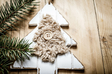 top view of beige and green Christmas decorations cozy home hygge