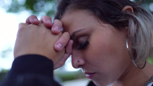 Spiritual young woman worshiping God looking at sky with HOPE and Faith