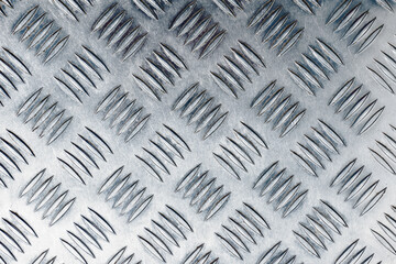 Metal grid walkway. Grunge steel mesh texture. Heavy iron backdrop pattern. Industrial grate design background. Anti slip metal matt texture.