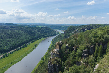 View from Bastei over the valley of the River Elbe with rock formation in foreground, Saxon Switzerland, Germany