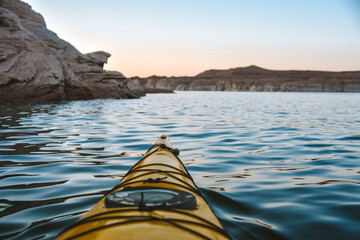 Kayaking in the spring on Lake Powell when the water level is low near Page, Arizona near the Utah...