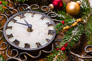 New Year Clock shows the time 5 minutes before the New year. Concept Background of Countdown to Celebrate New Year. Selective focus.