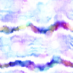 Seamless seventies tie dye stripe bokeh texture. Hippie summer wavy striped repeat background with ink dyed effect.