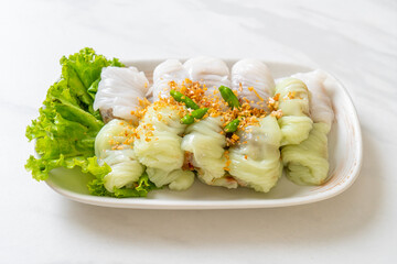 ( Kow Griep Pag Mor)Pork Steamed Rice Parcels