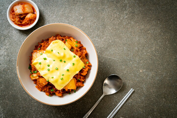 kimchi fried rice with pork and topped cheese